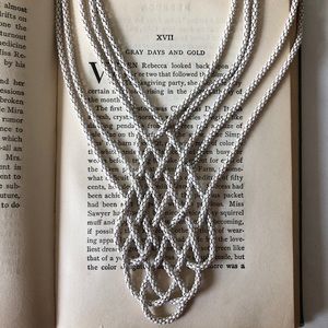 Stylish Express white metal woven necklace